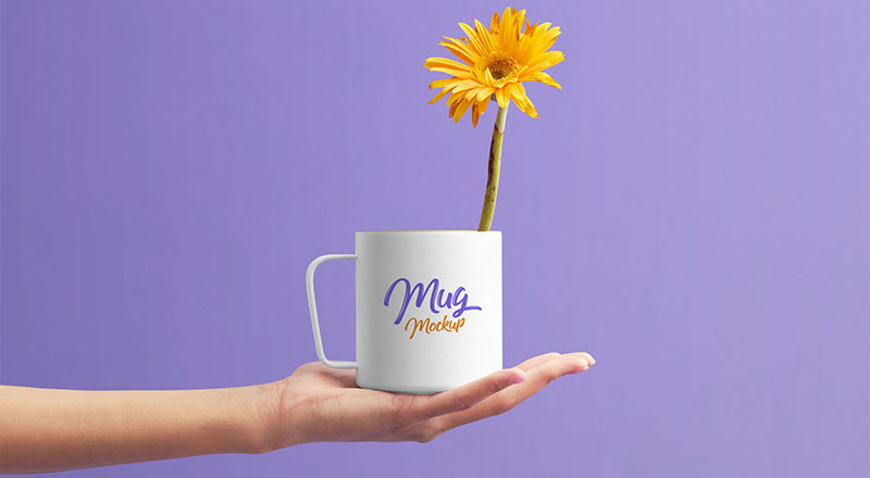 Download Free Mug on Female Hand Mockup PSD | Designbolts