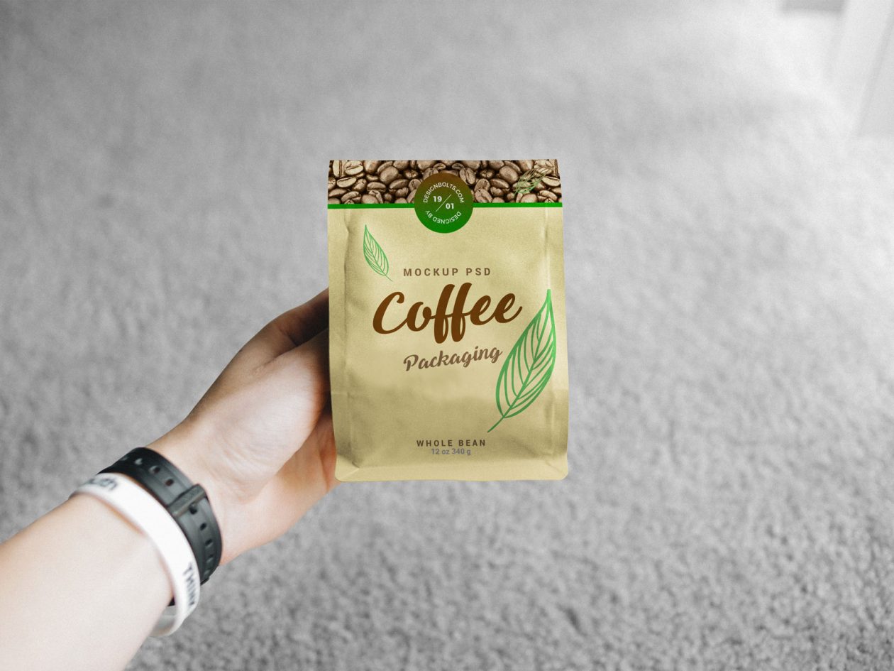 Download Free Hand Holding Coffee Bag Packaging Mockup PSD | Designbolts