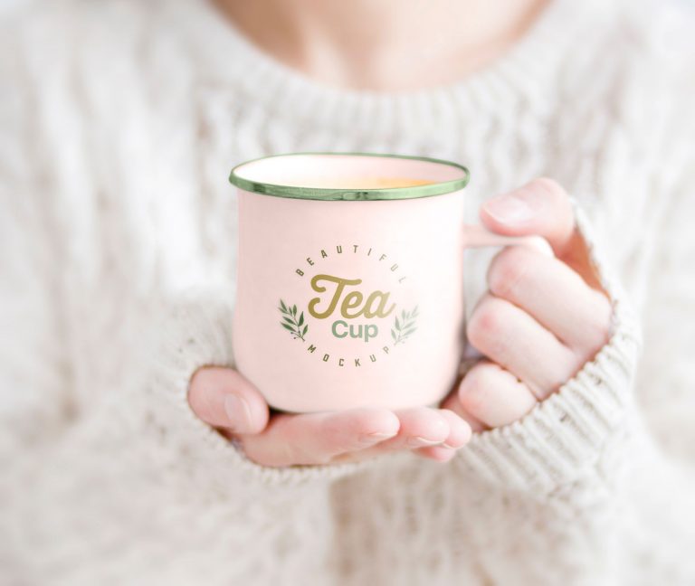 Female Holding Tea Cup Free Mockup PSD | Designbolts