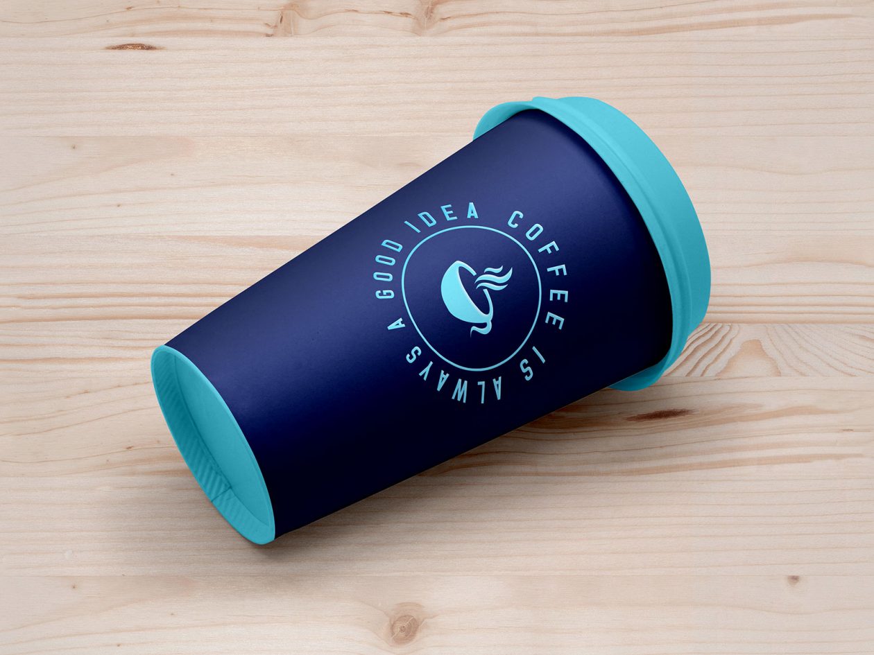 Download Free Paper Coffee Cup Lying on Floor Mockup PSD | Designbolts