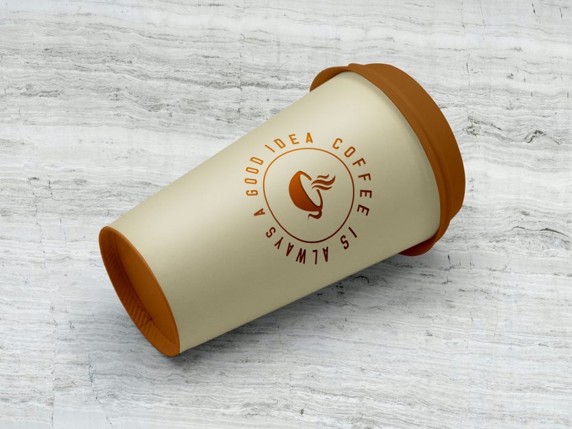 Free Paper Coffee Cup Lying on Floor Mockup PSD | Designbolts